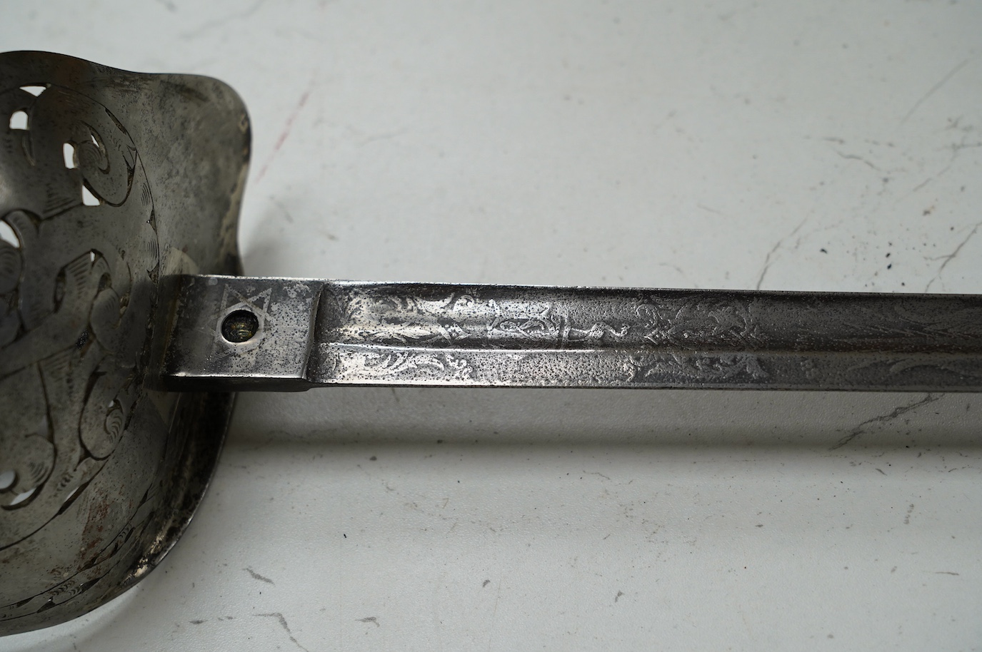 A Victorian 1897 pattern Royal Engineers officer’s sword by Wilkinson, No. 27191, etched with regimental devices, owner’s crest and initials, regulation steel guard, blade 83cm. Condition - poor